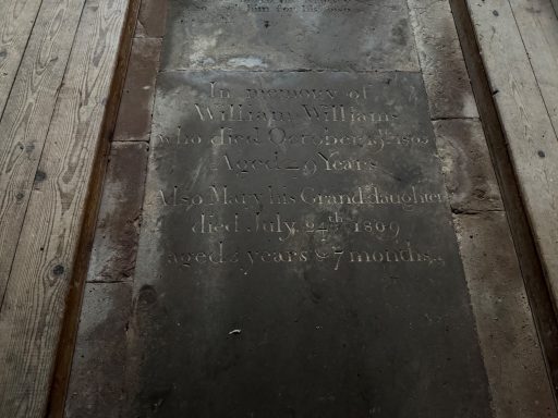 Ledger stone in chancel