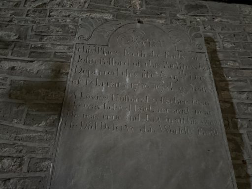 Memorial tablet by font